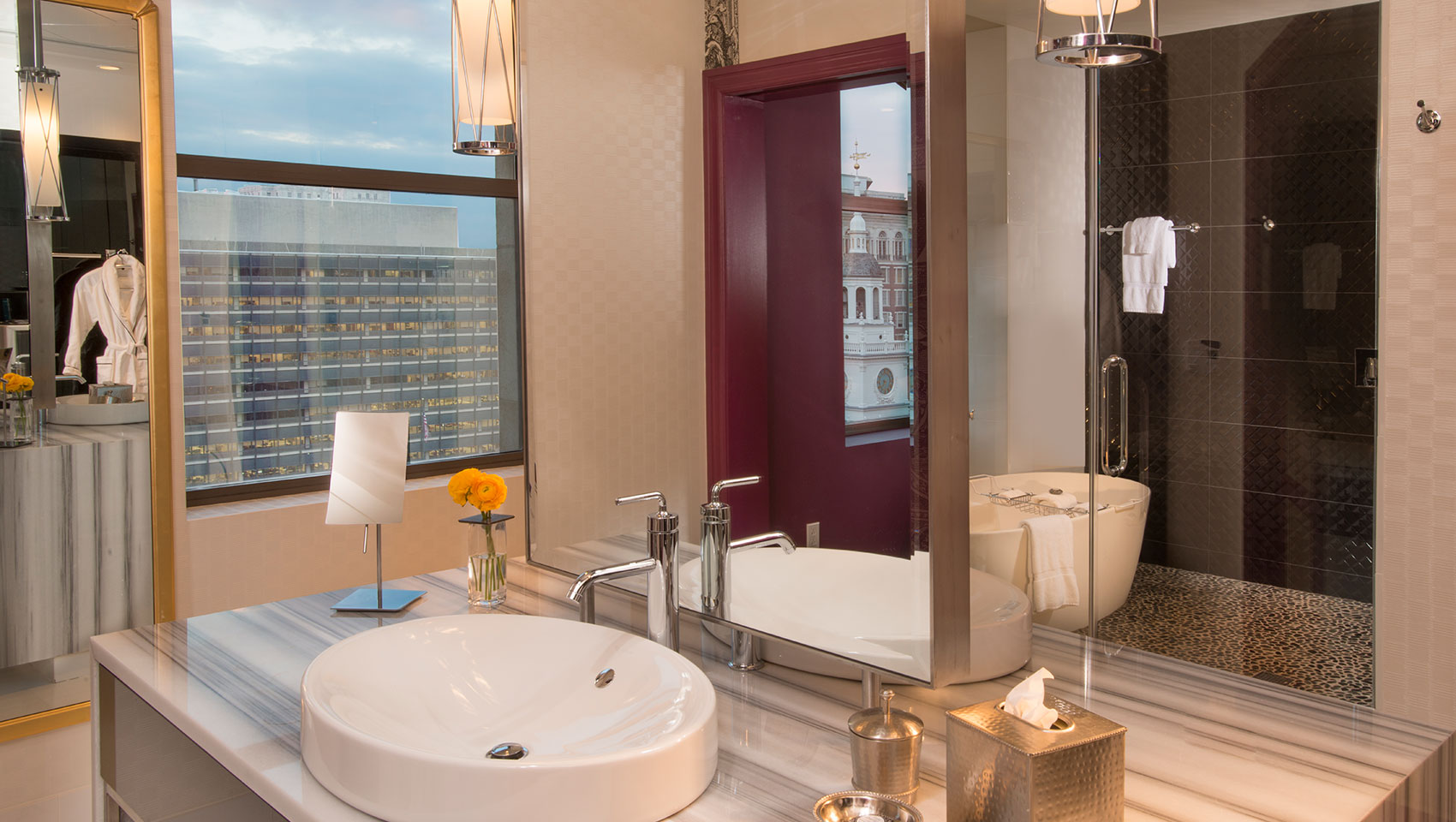 Presidential Suite Bathroom sink with view of tub at Kimpton Hotel Monaco Philadelphia